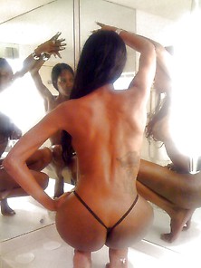 Busty Ebony Babe Posing Nude In The Shower