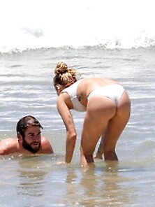 Miley Cyrus Wearing A Thong Bikini On A Beach In Australia