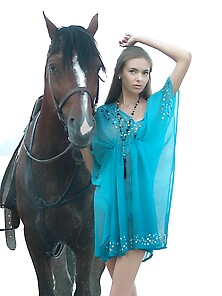Horse Girl Posing Next To A Wild Stallion In A Outdoor Erotic Sh