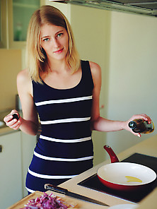 Striped Get-Up Blue-Eyed Blonde Ends Up Stripping During Cooking