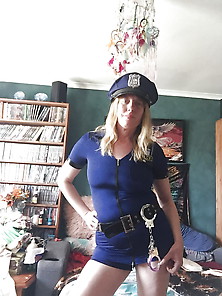 Dressed Up As Sexy Policewoman