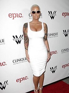 Amber Rose Displays Huge Tits And Fine Ass