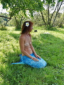 Mermaid Plays With Water