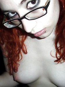 Nerdy Redhead With Glasses Shows Off