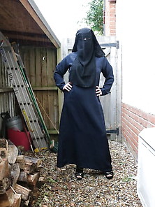 Burqa Outdoors Flashing In The Rain