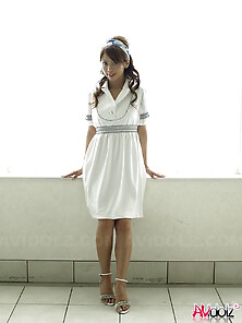Modest Japanese Sweetie Dressed In White Dress That Accentuates