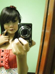 Tiny Cute Asian Teen Doing Self Shot Poses And Being Naughty