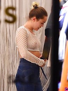 Miley Cyrus Flashes Tits In A Fishnet Top While Shopping In Soho