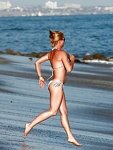Nicolette Sheridan Sizzles At The Beach