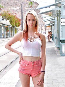 Girl In White Top And Pink Shorts Poses On Camera In Various Pub