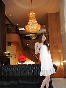 Charming Oriental Girl In A White Nightgown Flashes Charms Befor