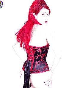 Corset Clad Hottie With Cherry Red Hair