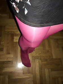 Shiny Pink Pantyhose And Leather Skirt