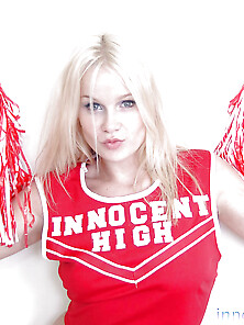 Cheerleader In The Red Innocent High Uniform Gives Upskirt View
