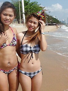 Thai Babes Rest On A Beach And Pose In Tight Bikini Flashing Inn