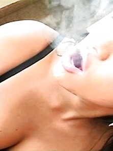 Asian Beauty Smokes And Sucks A Huge Meat...