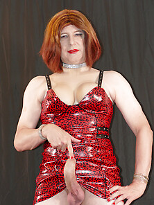 Tgirl Lucy Looking Very Dominant In Red Pvc Print Mini Dress