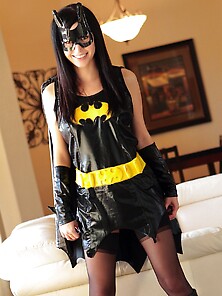 Black-Haired Fan Of Cosplay Takes Off Batman Costume And Poses N