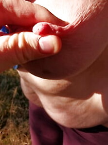 Nipple Stretching Outdoors