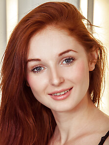 Red-Haired Sexpot Leona Honey Not Shy To Take Clothes Off And Sh