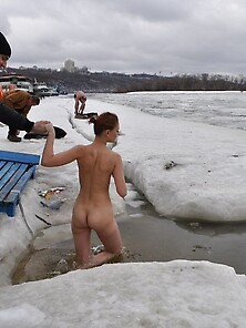 Russian Traditional Swimming In A Winter Ice Hole