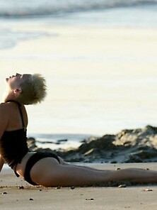 Miley Cyrus Doing Yoga In Her Bikini