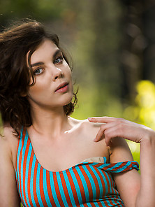 Curly-Haired Forest Nympho Takes Off Her Striped Onesie Outdoors