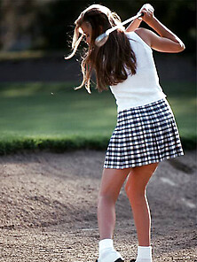 Teenage Chick Playing Golf