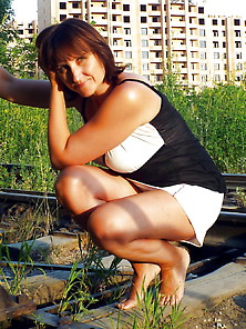 Elena Lansky,  My Mom Posing On Rails