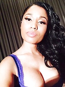Busty Nicki Minaj Likes Showing Off Her Huge Round Tits