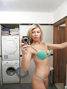 Amazing Blonde Girl Staged Selfies In The Bathroom