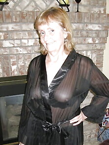 Granny Posing Up In Her Sexy Black Negligee