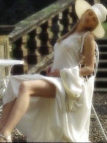 Classy Blonde In A Big Hat Exploring Her Mansion And Posing Nake