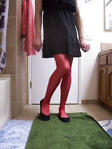 Crossdresser Samantha In A Black Dress With Red Garters & St